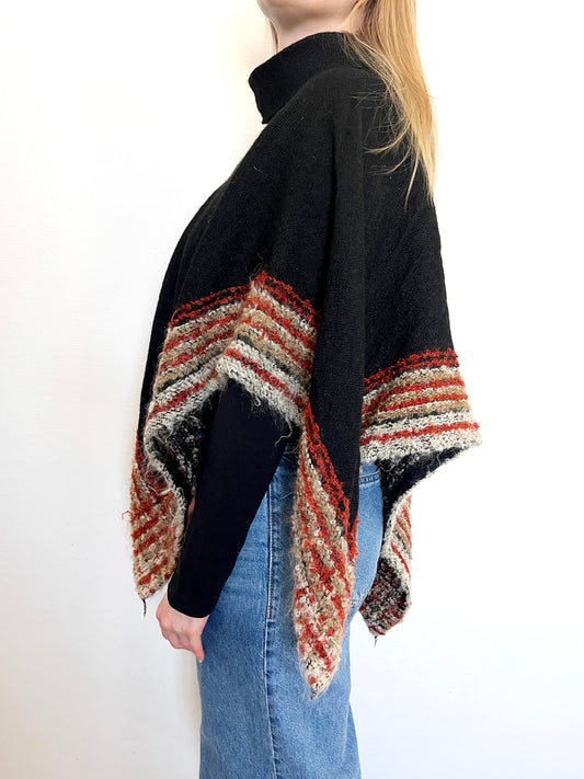 60s black poncho with striped hem