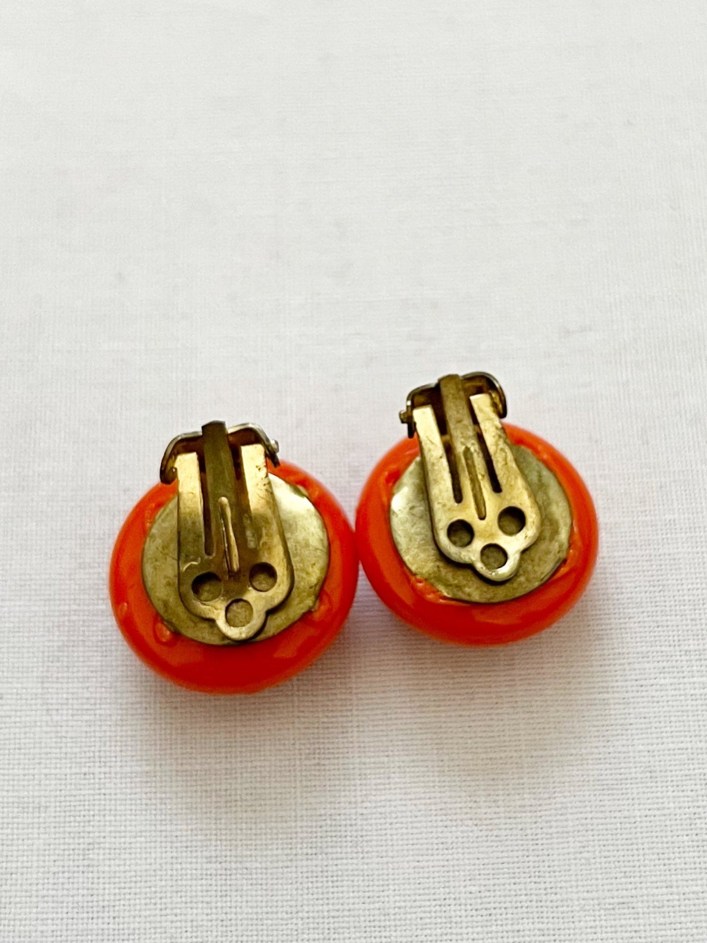 Orange clip-on earrings