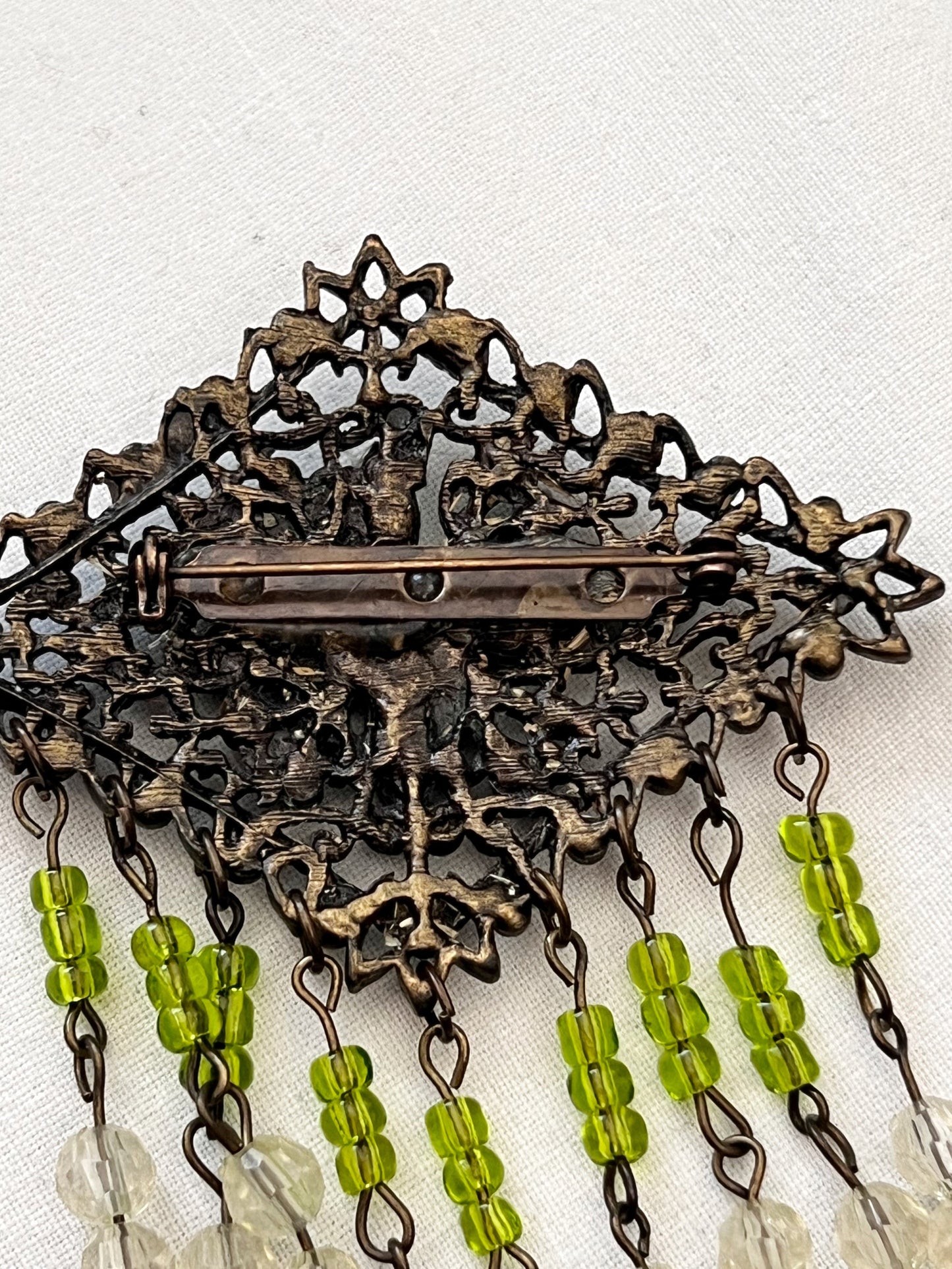 Green beads brooch