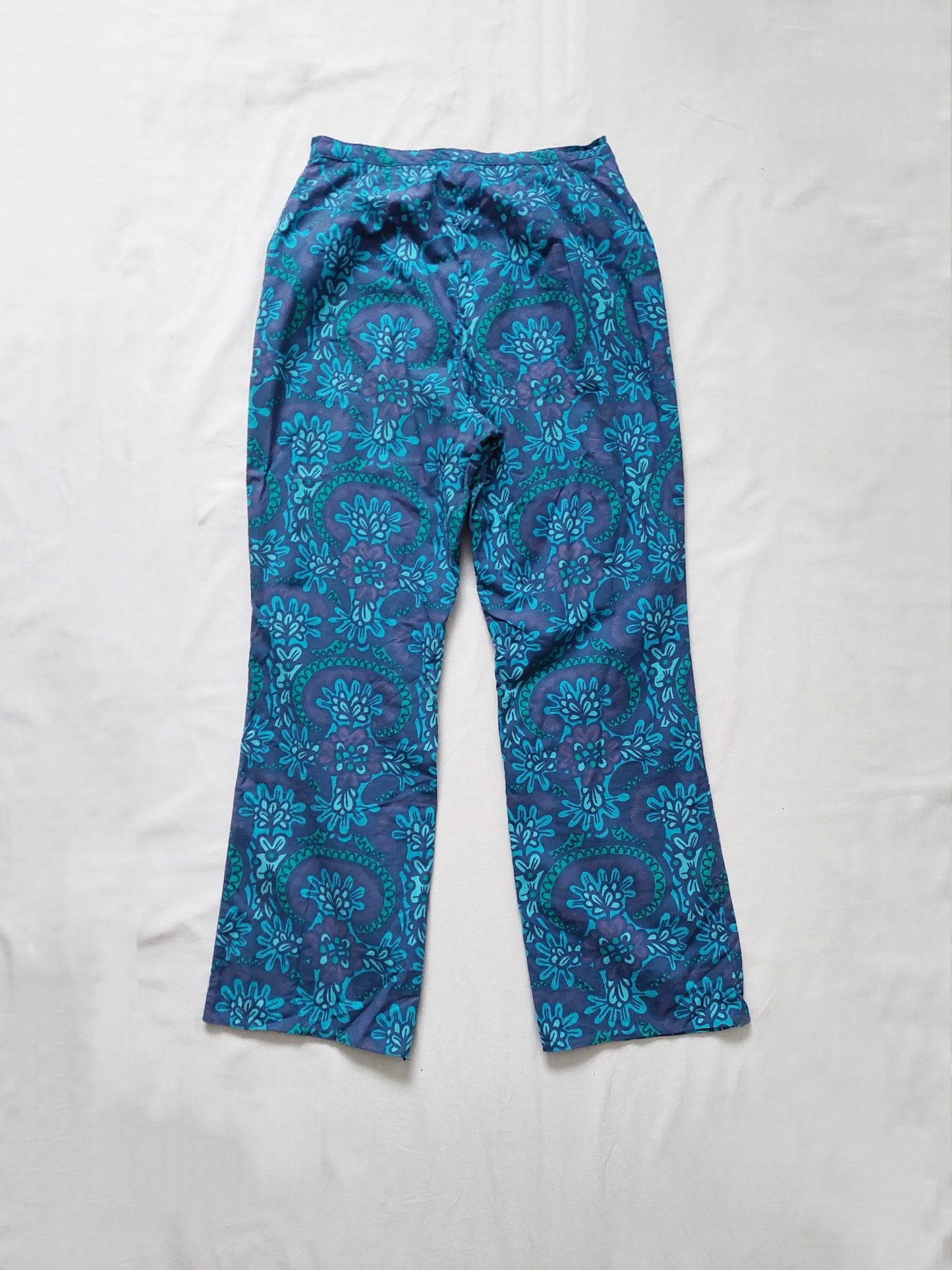 The back of the blue pants