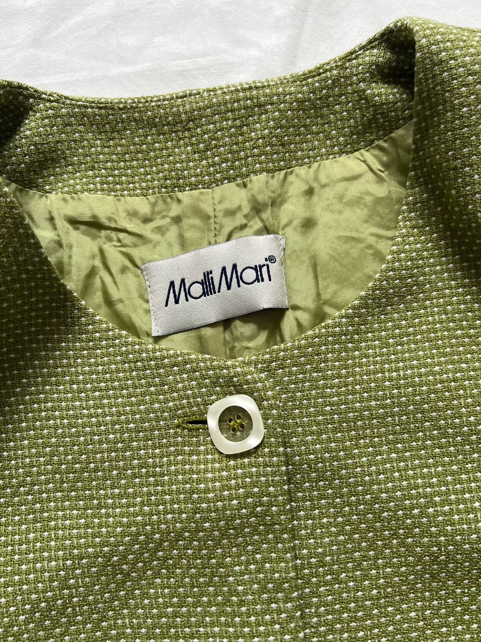 A green vintage suit