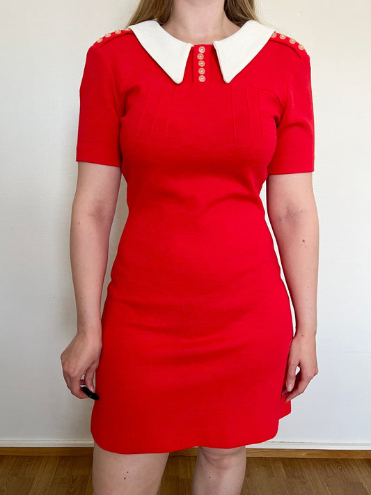 A vintage 60s red dress with a white collar