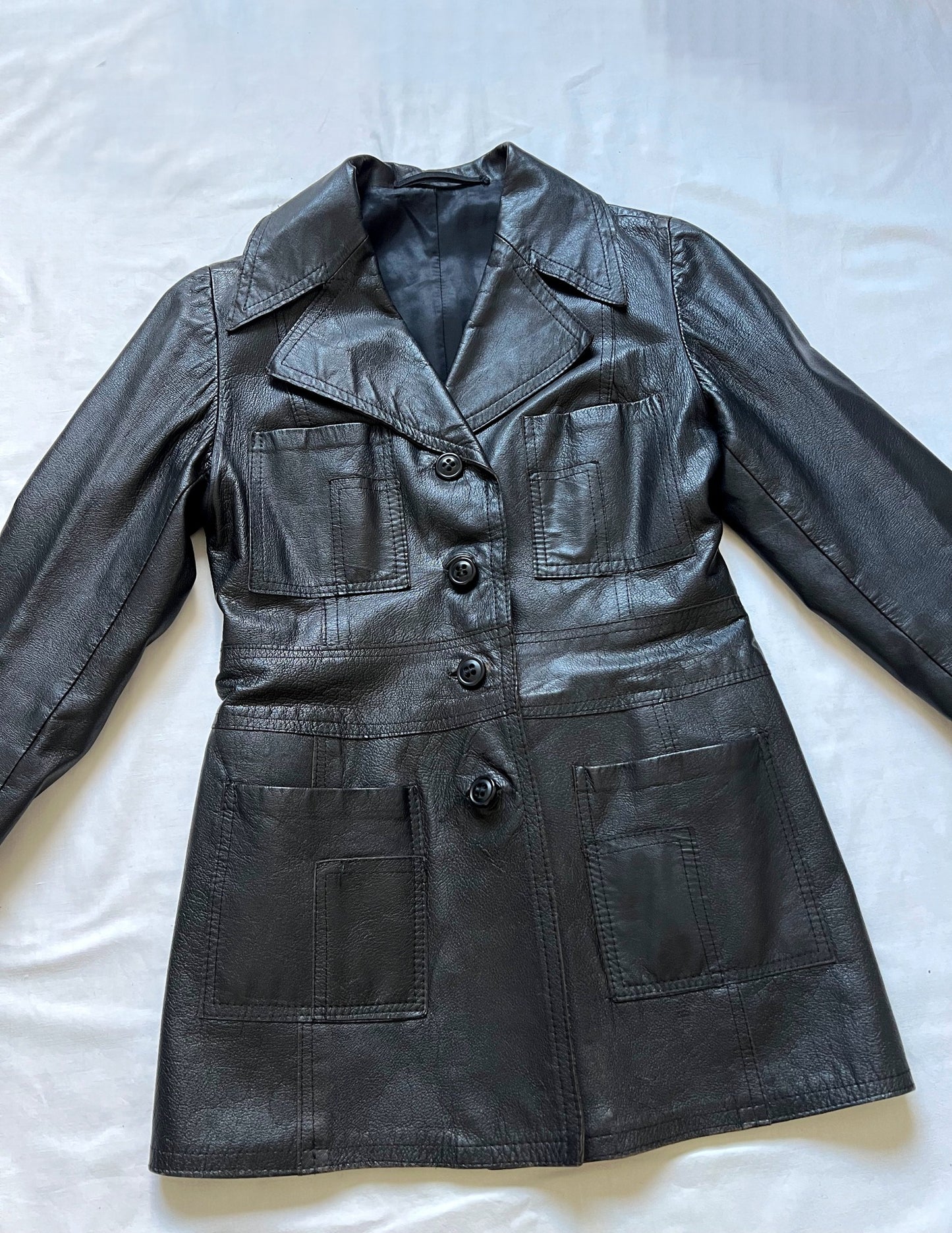 A 70s vintage black leather jacket