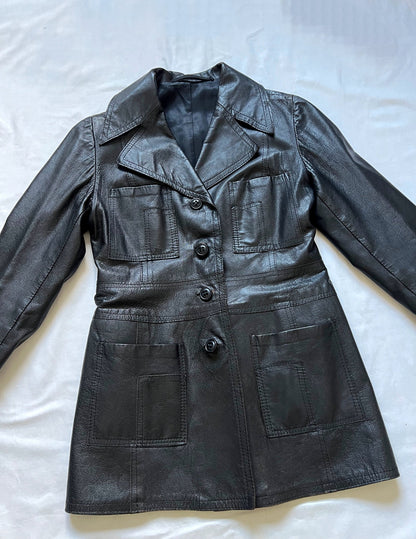 A 70s vintage black leather jacket