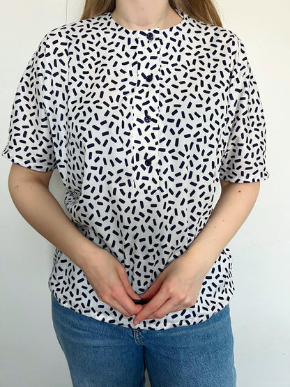 A person wearing the t-shirt