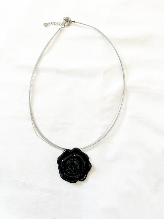 A black rose necklace