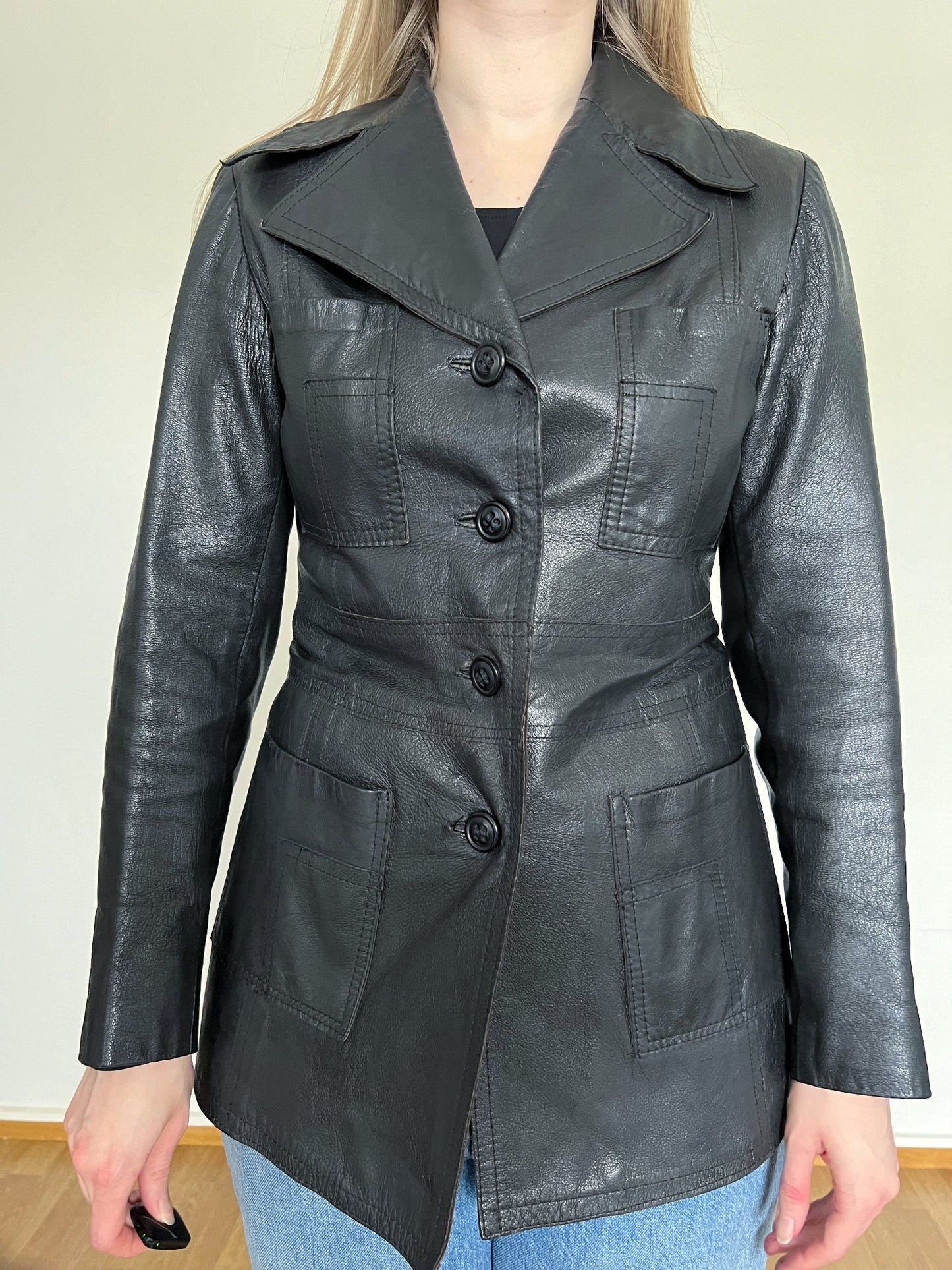 A 70s vintage black leather jacket