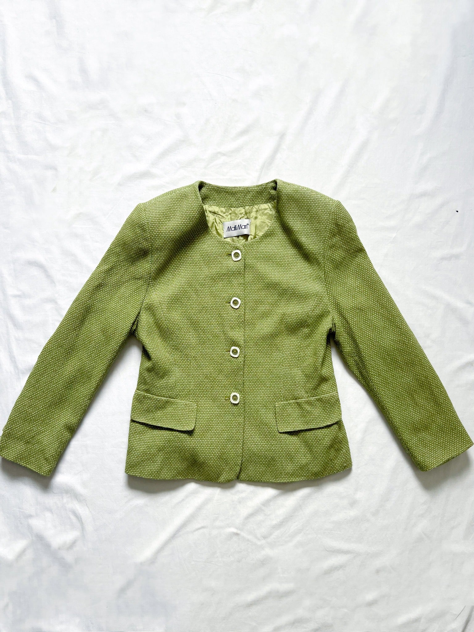 A green vintage suit