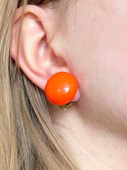 Orange clip-on earrings