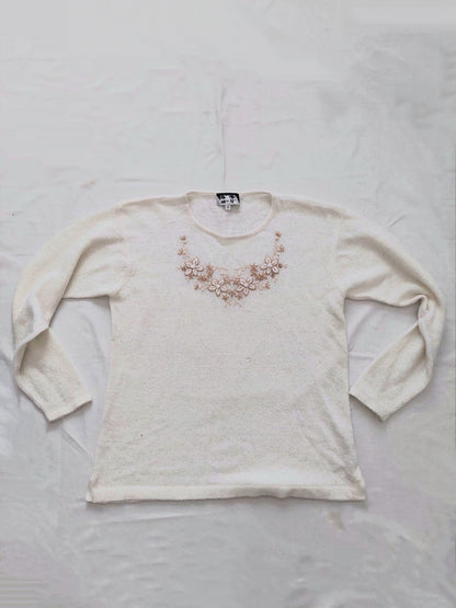 A white flower sweater