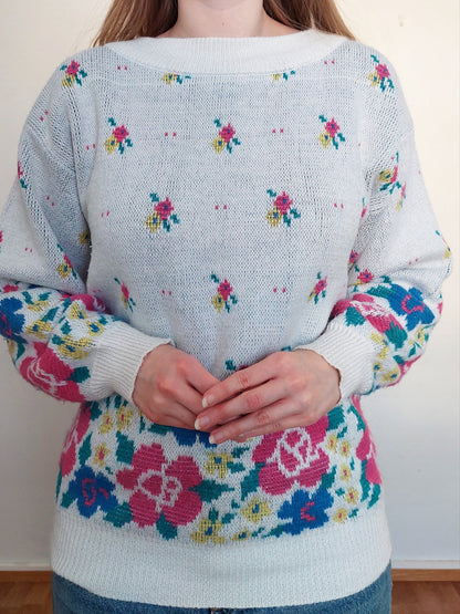 A person wearing the flower sweater