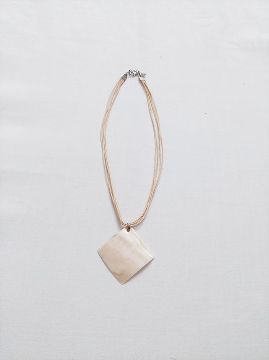 A white stone necklace